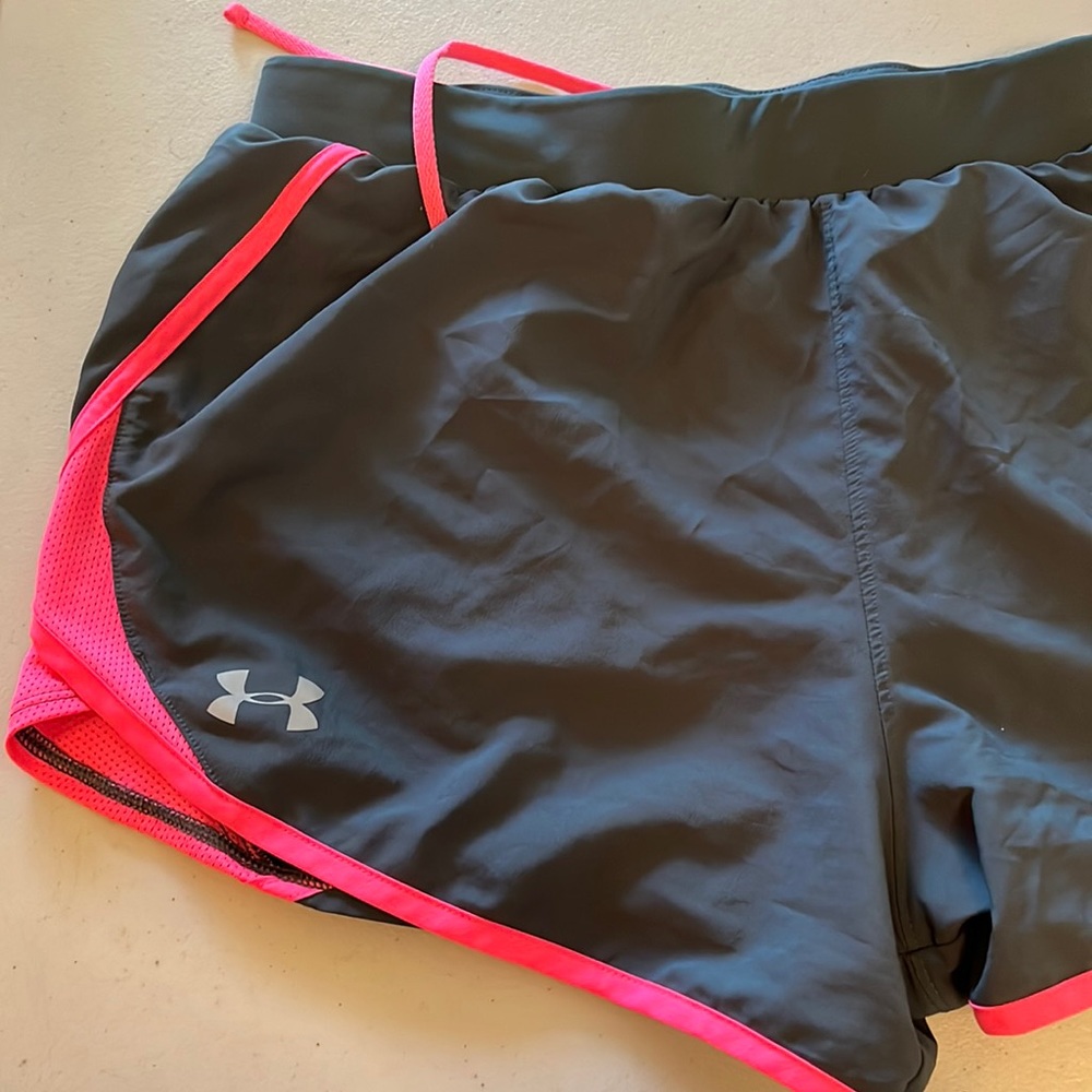Gray and Pink Under Armor athletic shorts